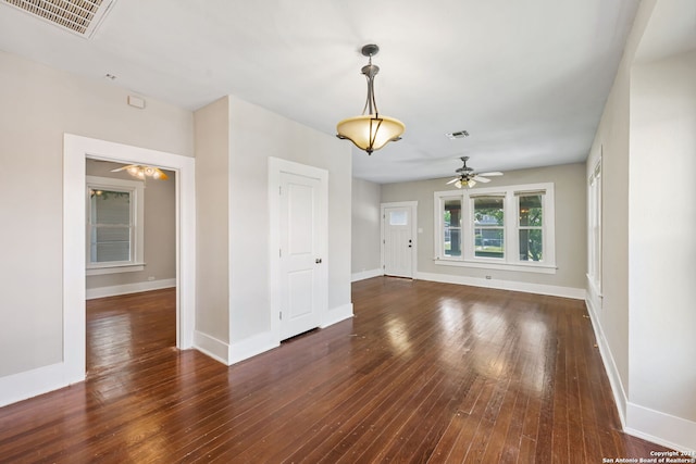 spare room featuring hardwood / wood-style flooring and ceiling fan