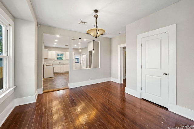 unfurnished living room featuring tile patterned flooring