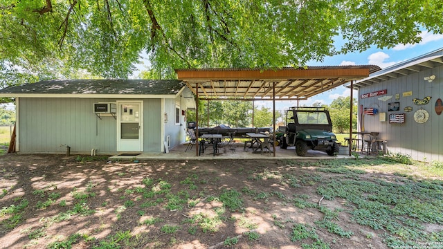 exterior space featuring a wall mounted AC