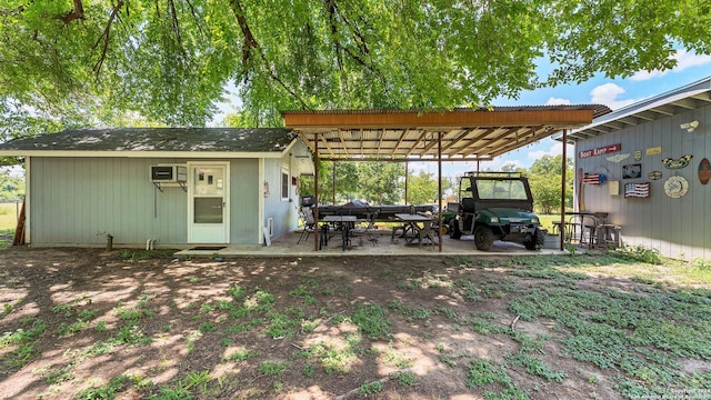 exterior space with a carport