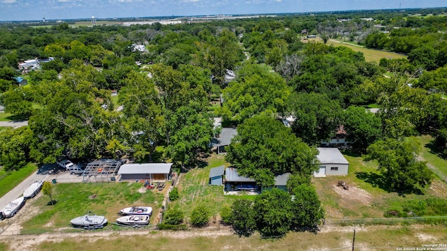 bird's eye view featuring a forest view