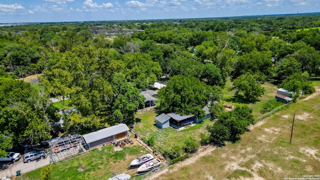 aerial view featuring a view of trees