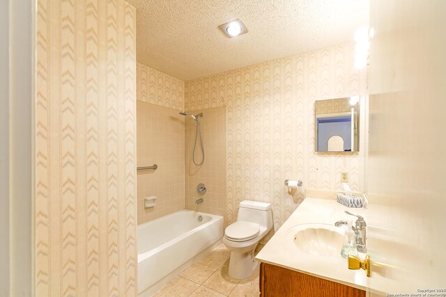 hallway with carpet, sink, and a textured ceiling