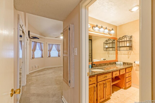 rec room with light colored carpet, lofted ceiling, and ceiling fan