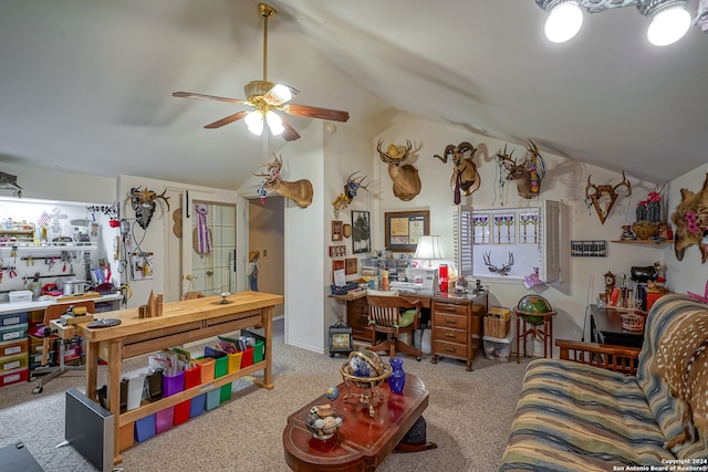 carpeted living room with ceiling fan and lofted ceiling