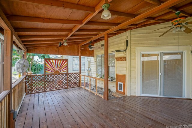 sunroom featuring wood ceiling and lofted ceiling