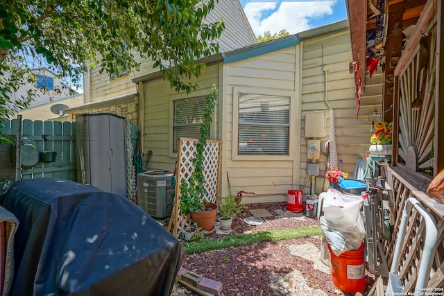 exterior space featuring central AC unit