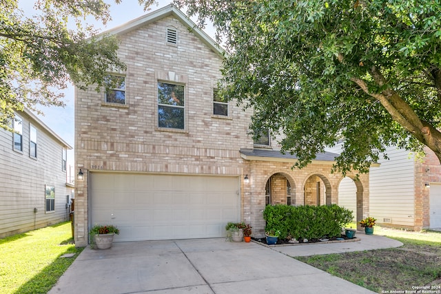 front facade with a garage