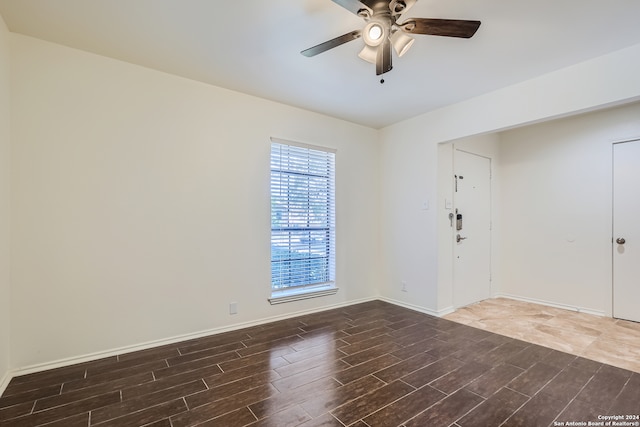 unfurnished room featuring ceiling fan and hardwood / wood-style flooring