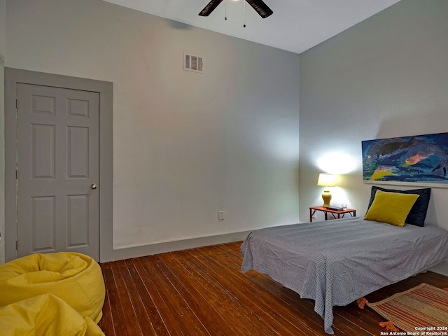 bedroom featuring hardwood / wood-style floors and ceiling fan