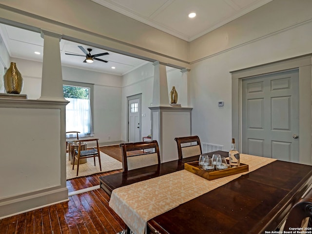 dining area with ceiling fan, decorative columns, hardwood / wood-style floors, and ornamental molding