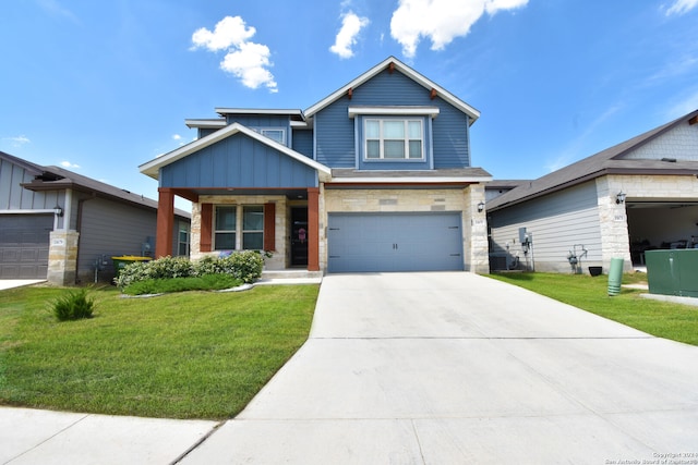 craftsman-style home with a garage and a front lawn