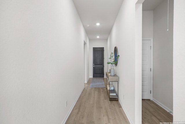2039 Newforest Peak, New Braunfels, TX 78130 - hallway featuring light wood-style floors, recessed lighting, and baseboards