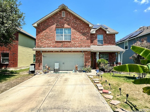 view of front property featuring a garage, solar panels, and a front lawn