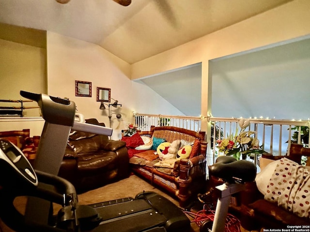 interior space featuring ceiling fan and vaulted ceiling