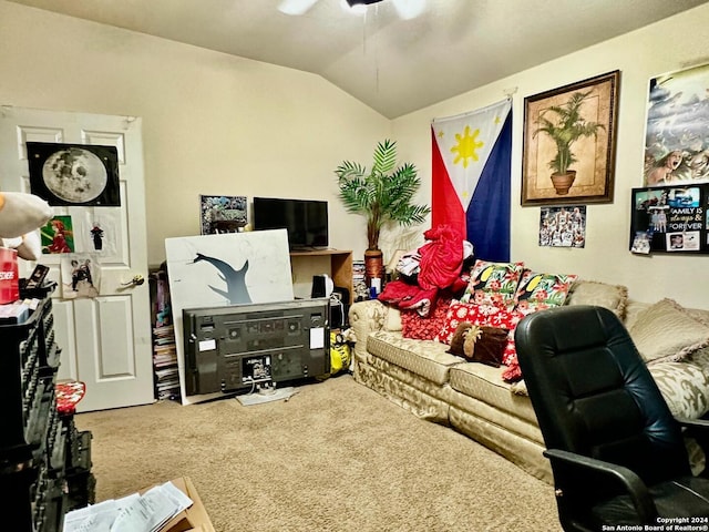 living room featuring carpet floors and lofted ceiling