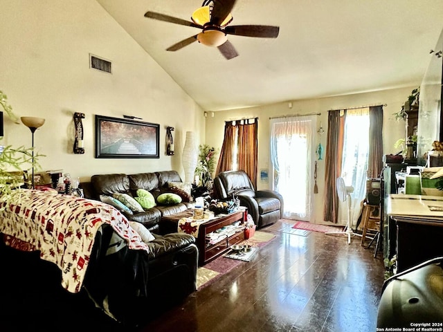 living room featuring ceiling fan and high vaulted ceiling