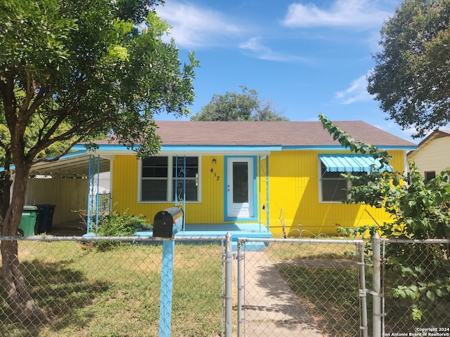 view of front of house featuring covered porch and a front lawn