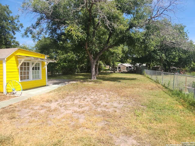 view of yard with fence