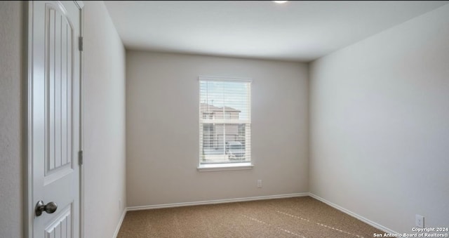 view of carpeted spare room