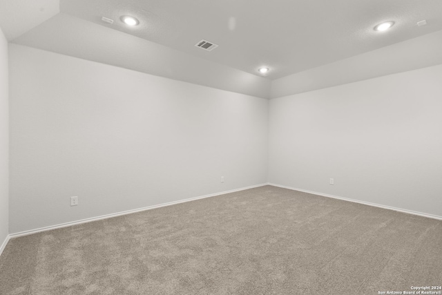 spare room with carpet