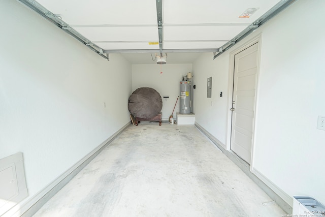 garage featuring electric panel, electric water heater, and a garage door opener