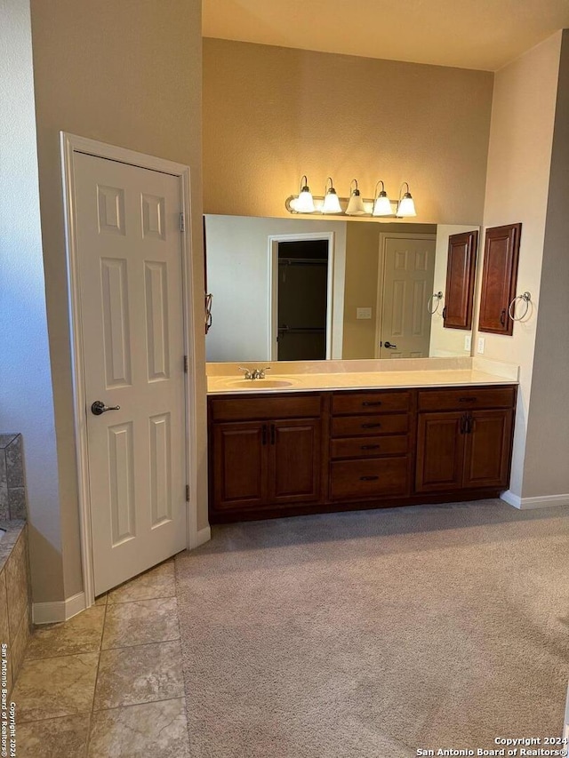 bathroom featuring double vanity and tile patterned floors