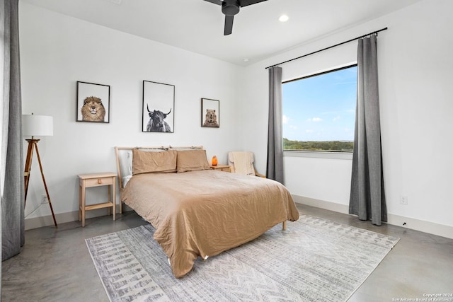 bedroom with recessed lighting, a ceiling fan, concrete flooring, and baseboards