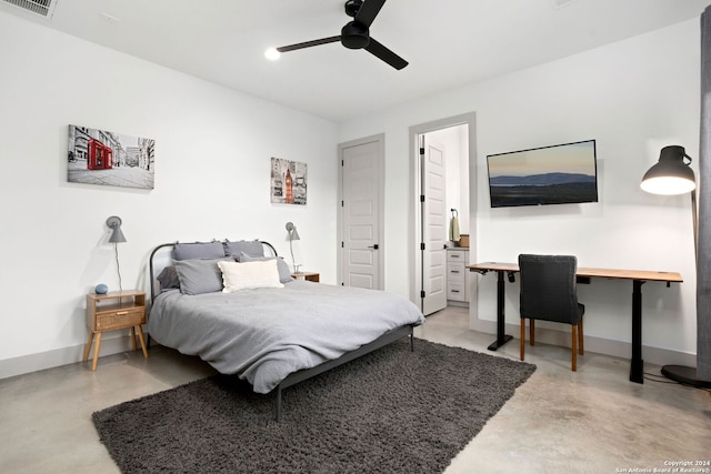 bedroom featuring ceiling fan, visible vents, baseboards, and finished concrete floors