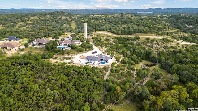 aerial view featuring a view of trees