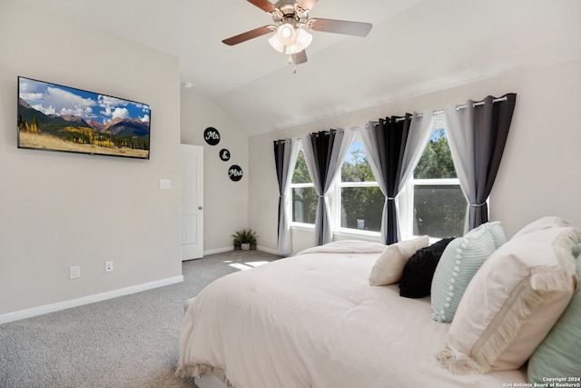 bedroom featuring ceiling fan, carpet flooring, and vaulted ceiling