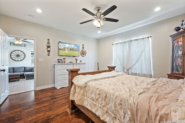 bedroom featuring ceiling fan and wood-type flooring