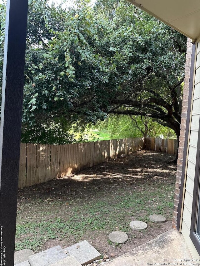 2542 Babcock Rd Unit E103, San Antonio, TX 78229 - view of yard featuring a fenced backyard