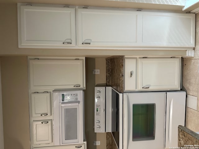 interior space with white cabinets