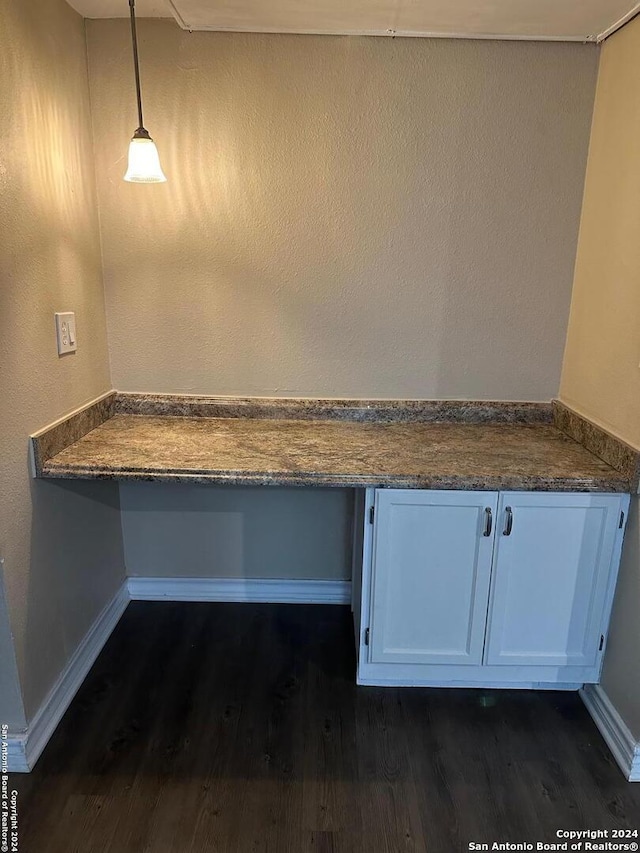 2542 Babcock Rd Unit E103, San Antonio, TX 78229 - unfurnished office with dark wood-style floors and baseboards