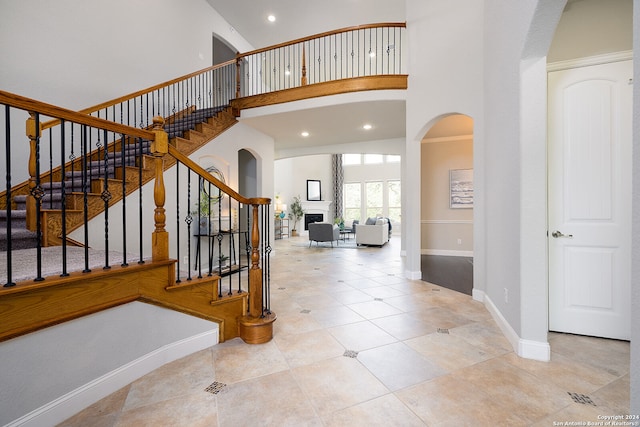 entryway with a high ceiling