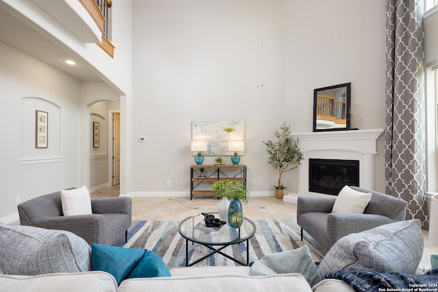 living room with a high ceiling