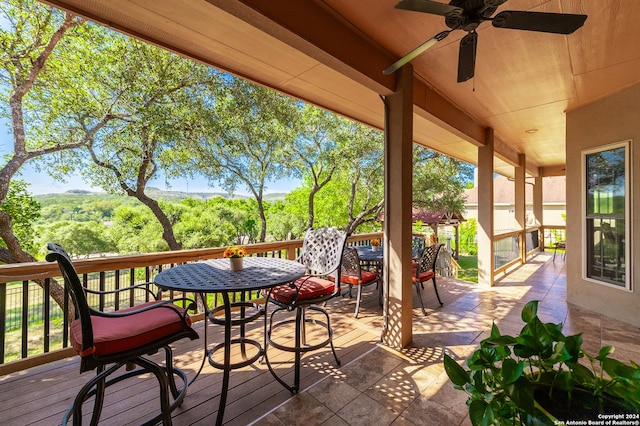 exterior space featuring a ceiling fan and outdoor dining space