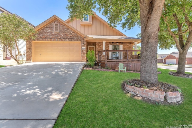 view of front of home featuring a garage and a front lawn