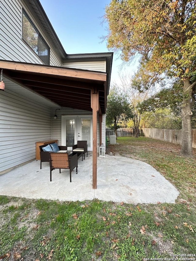 view of patio with fence and an outdoor hangout area