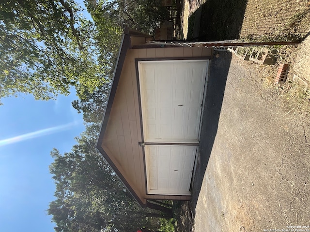 view of entry to storm shelter