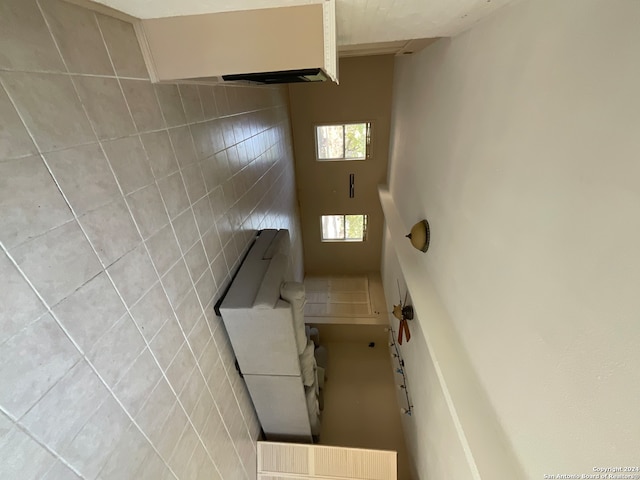 kitchen with tile walls