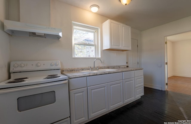 kitchen featuring dark hardwood / wood-style flooring, sink, white electric range oven, and white cabinets