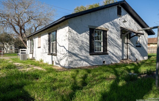 view of home's exterior with central air condition unit