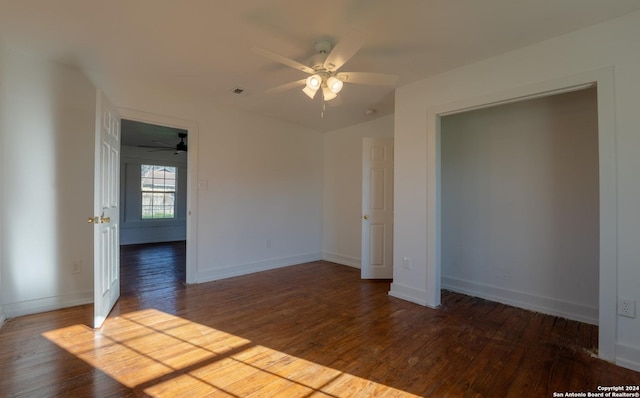 unfurnished bedroom with hardwood / wood-style flooring and ceiling fan