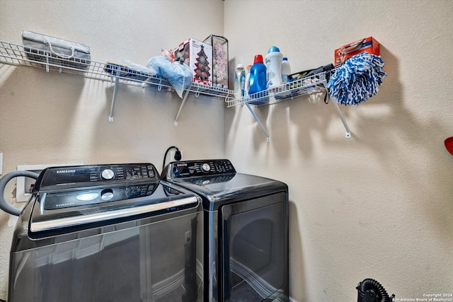 laundry area featuring independent washer and dryer