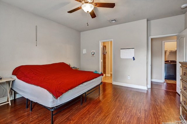 bedroom featuring ceiling fan and dark wood-type flooring