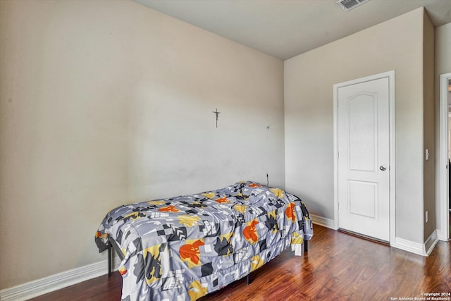 bedroom featuring wood-type flooring