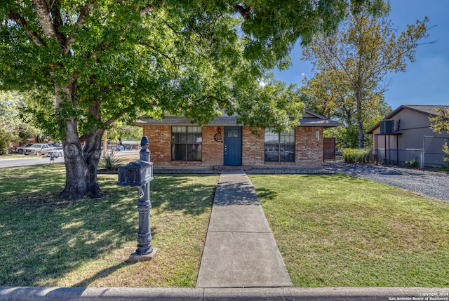 view of front of home with a front yard