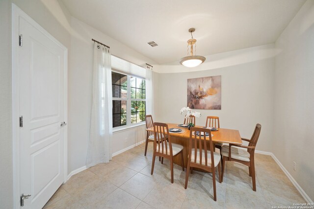 view of tiled dining space